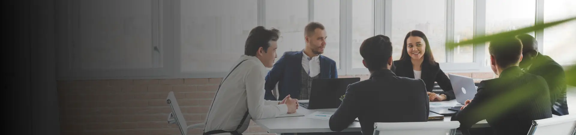 Business Coach in Calgary working with entrepreneur in office setting